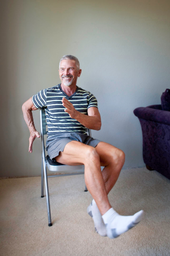 Michael G doing chair fitness at home
