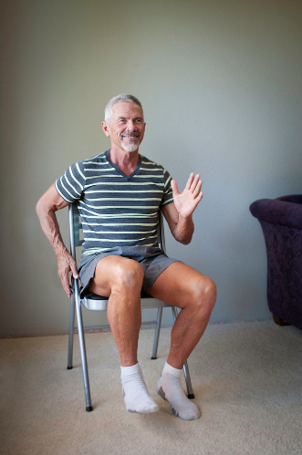 Michael G doing chair fitness at home