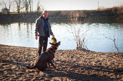 Michael G with his dog Rufus at the river